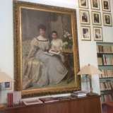 Il ritratto della donna col bambino a firma di Giacomo Grosso, presente nella biblioteca dell'Accademia delle Scienze